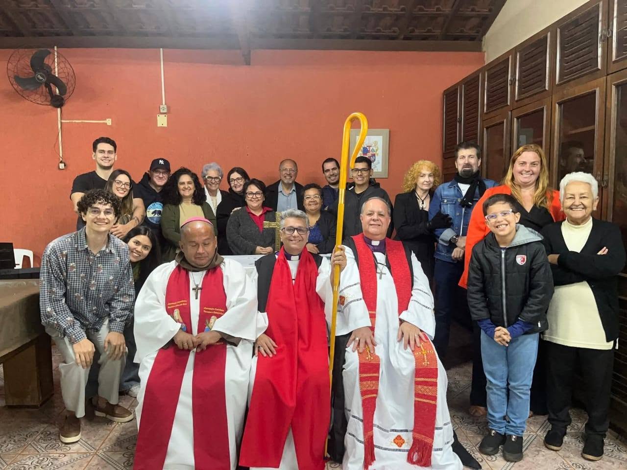 Archbishop Ricardo Lorite de Lima with clergy and members of the congregation. Date unknown.