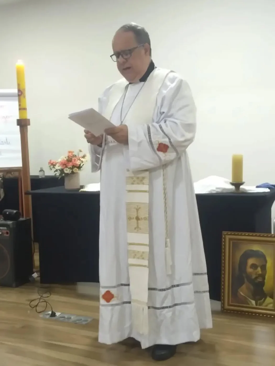 Archbishop Ricardo Lorite de Lima reading during worship. Date unknown.